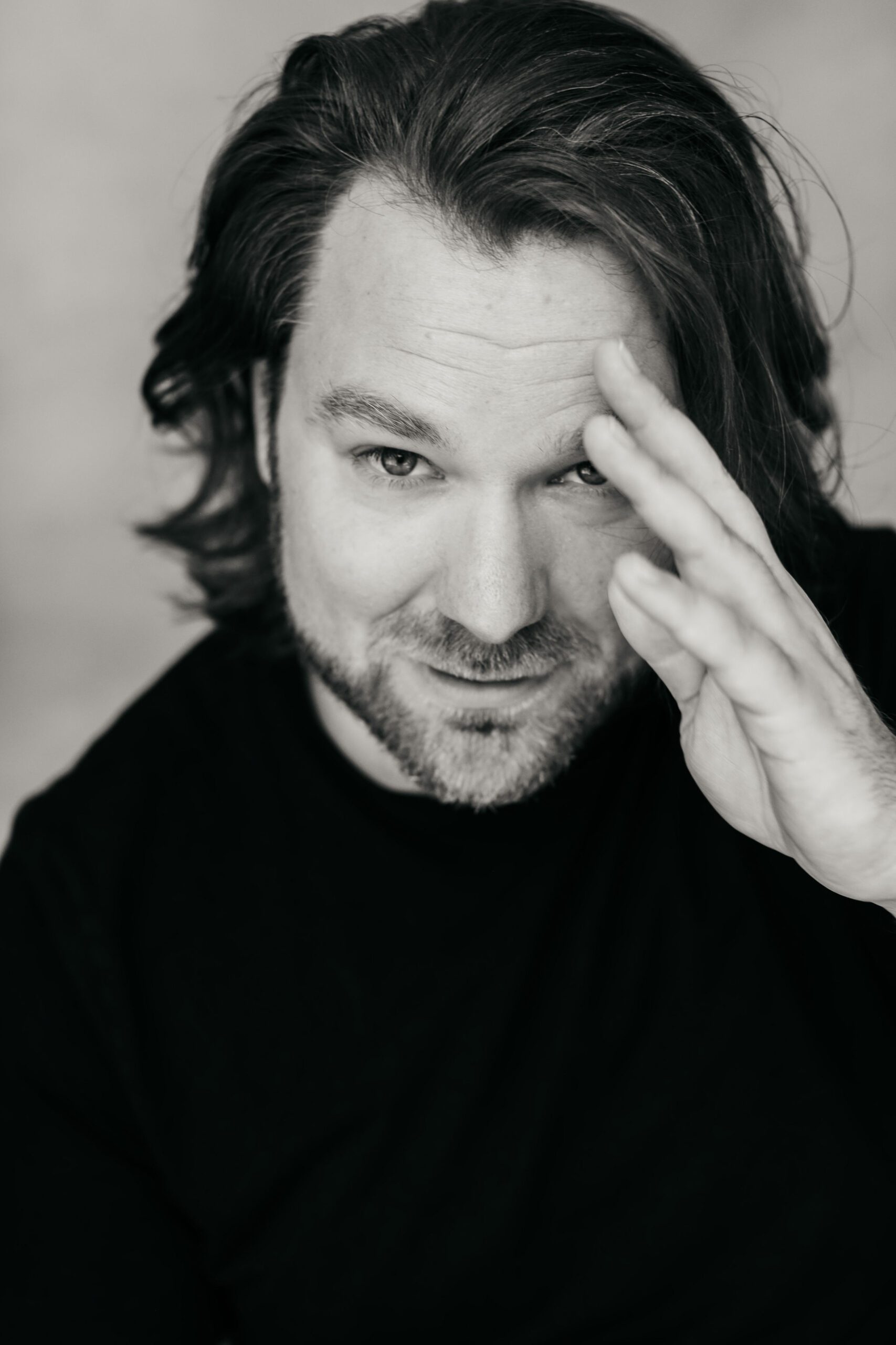 Black and white headshot of Ruud van Overdijk, singer, actor, and director